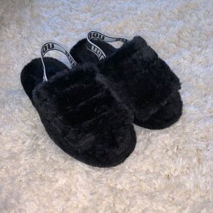 1 pair of fluffy ugg slides.